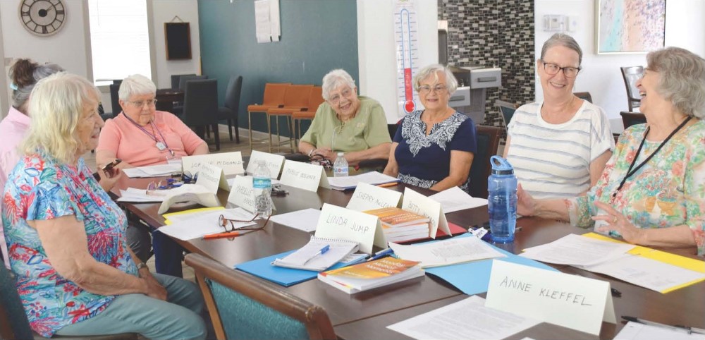 Mentor Betty Jackson, right, shares a laugh during a memoir writing class she facilitates at Glenbrooke in Palm Bay. Class members include Mardelle Hansen, left, Samantha Truckenbrodt, Joanne McDonald, Bobbi Leigh, Margie Boehoer and Sherry MacLean.